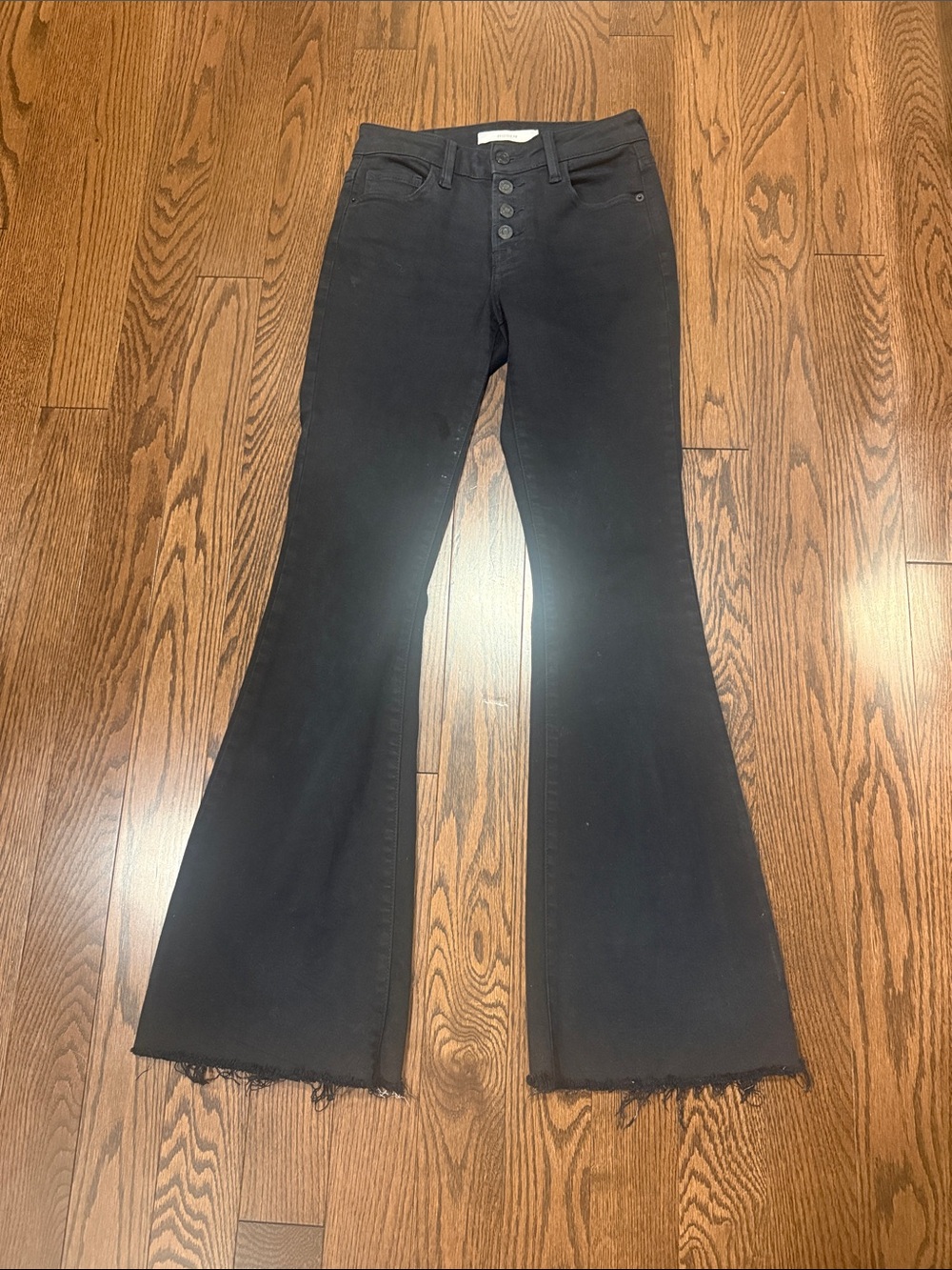 High-Rise Black Flared Jeans with Button Front
